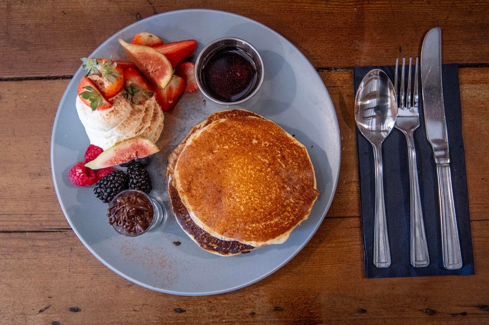 pancakes-strawberries-and-chocolate-sauce